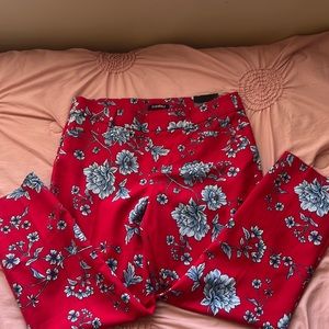 Bright and beautiful pants. Red pants with delicate blue flowers
